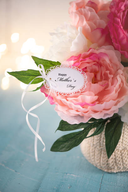istock Mother`s Day Greeting Card on a Flower Arrangement 1222114607