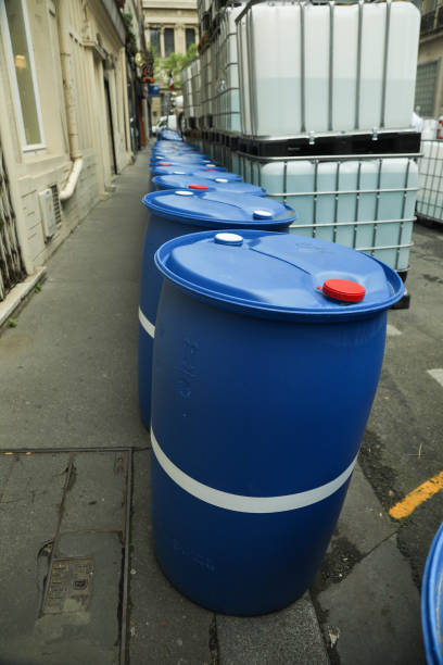 istock Chemical Plant, Plastic Storage Drums blue item 1222116149