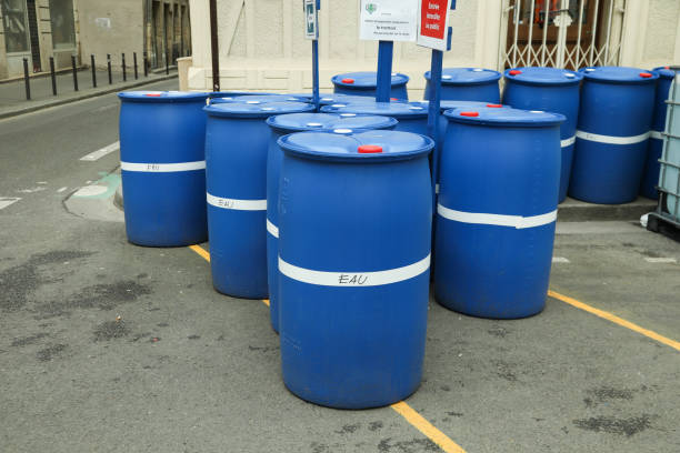 istock Chemical Plant, Plastic Storage Drums blue item 1222116193