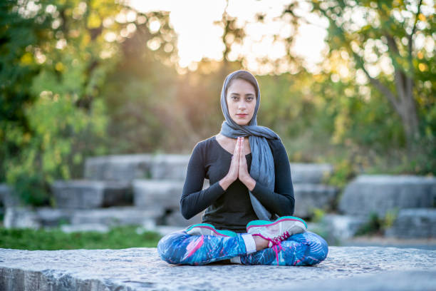 istock Young woman yoga 1222116241