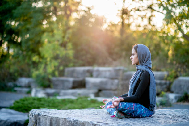 istock Young woman yoga 1222116246