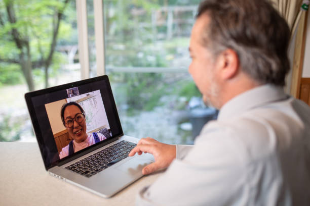 istock Online remote English lesson via laptop computer 1222122318