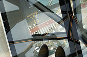 Looking down through glass floor