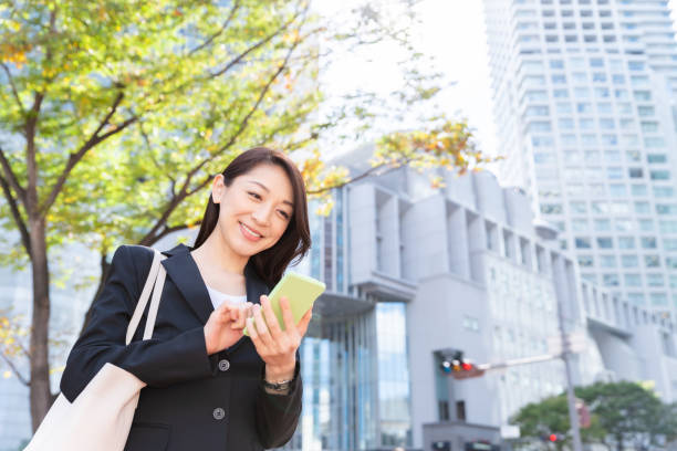 istock asian woman who see a smart phone 1222122928