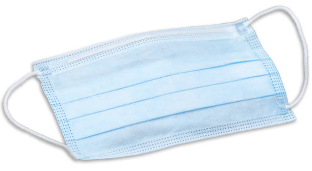 istock Blue medical grade surgical face mask, PPE personal protective equipment for protection against corona virus, influenza, air droplets and particle contamination. Health care and patient safety vector. 1222126977