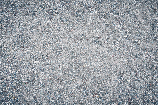 Ground asphalt texture. Surface grunge rough of ground asphalt, Tarmac grey grainy road, Texture Background, Top view. gravel mound stock pictures, royalty-free photos & images