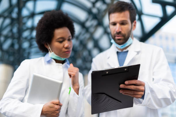 istock Doctors looking at medical results close up. 1222132843