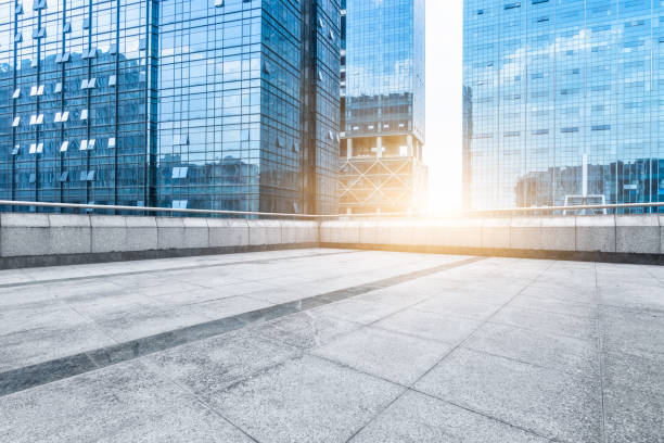 istock modern buildings and empty pavement in china 1222132934