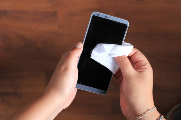 istock Cleaning and disinfecting cell phone 1222133101