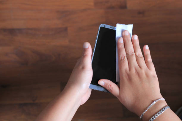 istock Cleaning and disinfecting cell phone 1222133624