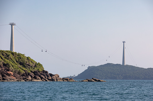 High cablecar connecting Dua and Roi islands to the south of Phu Quoc Island in sunny weather