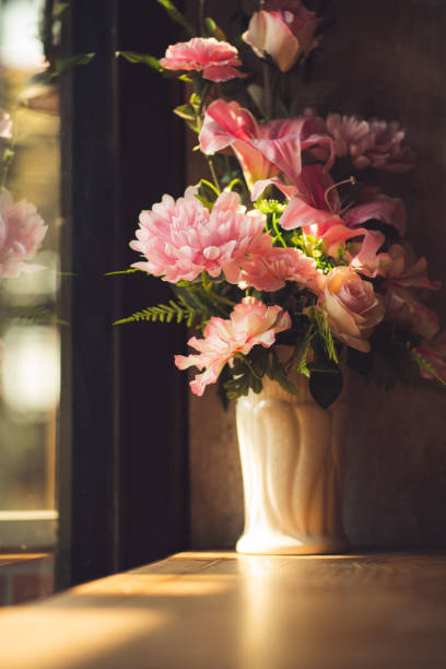 istock Flower vase in a coffee shop. 1222133810