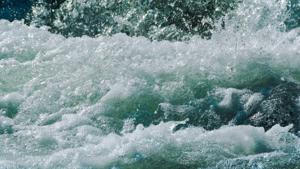 istock rough ocean waves, stormy sea surf, fast flowing mountain river 1222137474