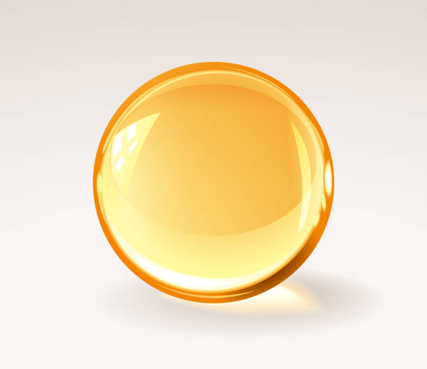 golden trasparent resine ball - realistyczna pigułka medyczna lub kropla miodu lub szklana kula - fish oil obrazy stock illustrations