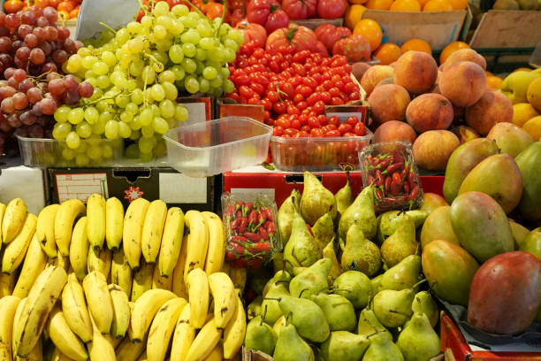 istock Fruits display (Banana,Pear,Mango,Peach,Grape)  in BArcelona market 1222147203