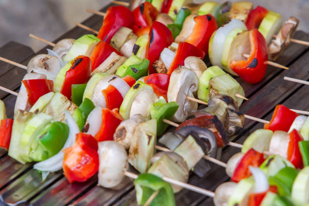 istock Vegetable skewers grilling on the barbecue 1222151174