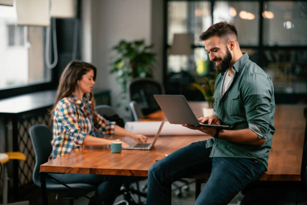 istock Colleagues working together in office. 1222155811