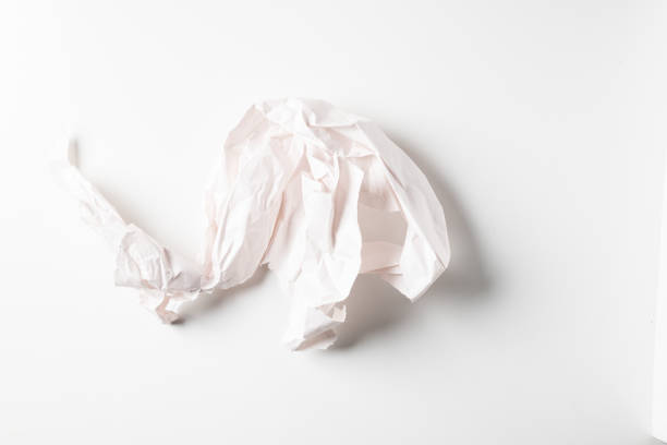 Pink crumpled isolated on white background.