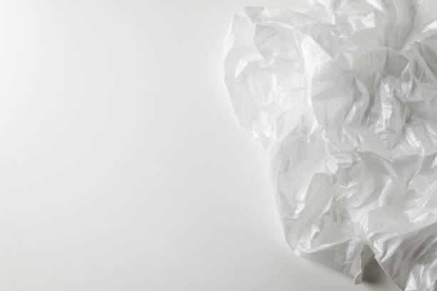 istock Squeeze a crumpled foam sheet isolated on white background with copy space. 1222156710