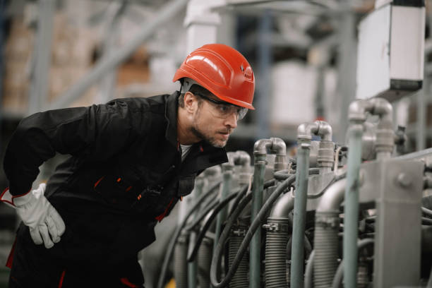 istock Handsome man working in factory. 1222157153