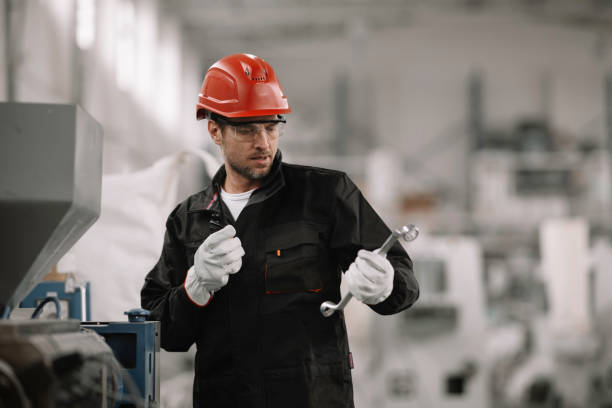 istock Handsome man working in factory. 1222157174