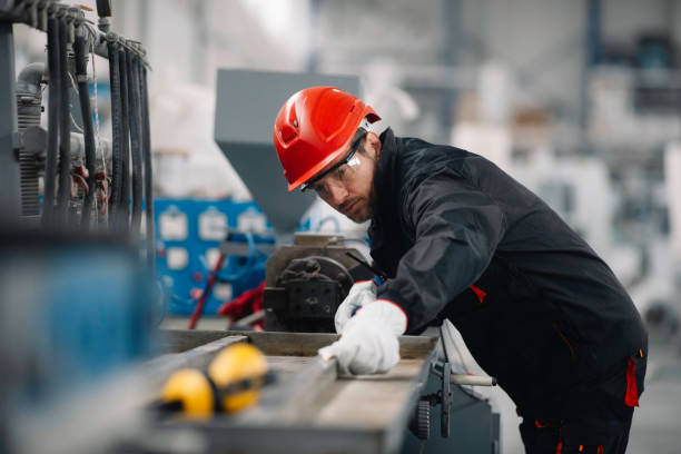 istock Handsome man working in factory. 1222157228