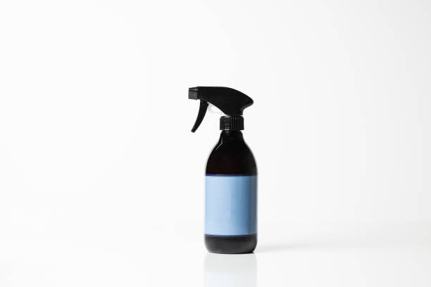 istock Black plastic bottle with trigger-spray and color label on a white background 1222157412