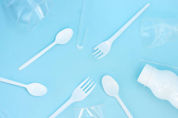 istock Plastic waste, plastic utensils on a blue background,flat lay. Concept of stop plastic pollution, recycling plastic. Ecology environmental care.Copy space for text. 1222161003