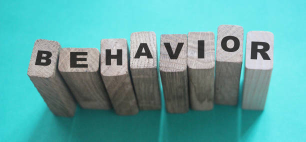 istock Behavior Word In Wooden Cube. Psychology human resources management concept 1222161031