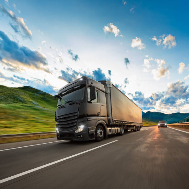 istock Truck with container on road, cargo transportation concept. 1222164531