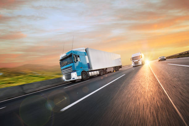 istock Truck with container on road, cargo transportation concept. 1222164562