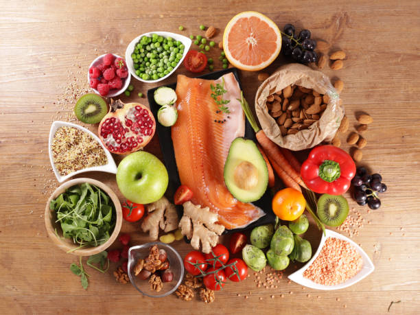 istock health food selection with fish, fruit and vegetable 1222167280