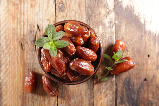 istock dried date in bowl and mint 1222168542