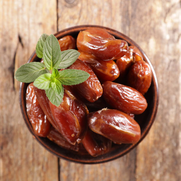 istock dried date in bowl and mint 1222168545