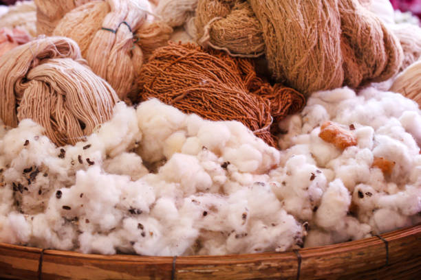 istock Fluffy cottons and  thread in wood tray 1222168592