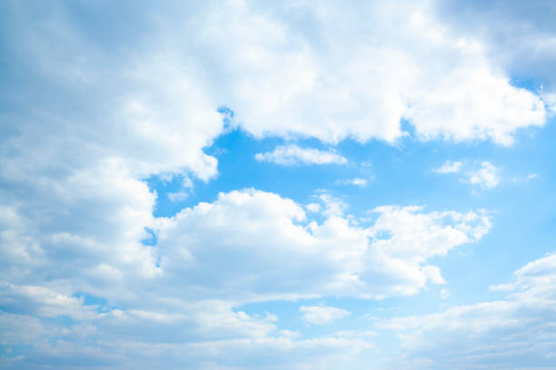 istock Huge clouds in blue sky lit by the sun, not windy. 1222169785