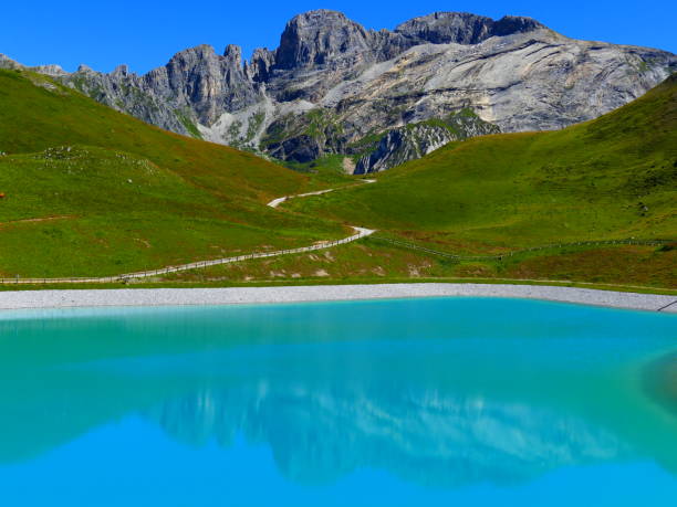 Artificial water retention, hiking to Lakes Merlet Artificial water retention, hiking to Lacs Merlet, Savoie courchevel stock pictures, royalty-free photos & images