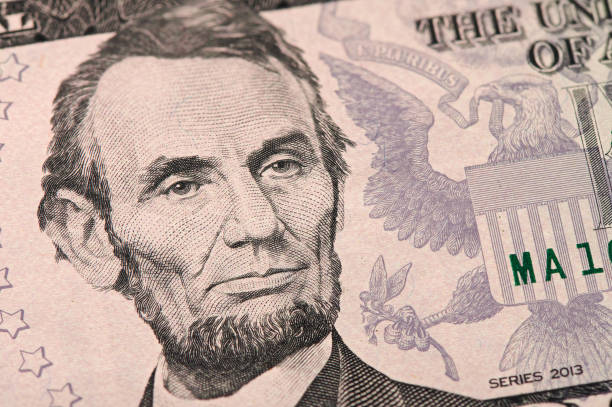 istock US president Abraham Abe Lincoln face portrait on a dollar bill 1222171994