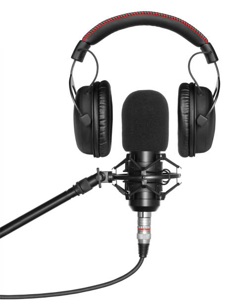 istock Studio microphone and headphones isolated on white 1222172030