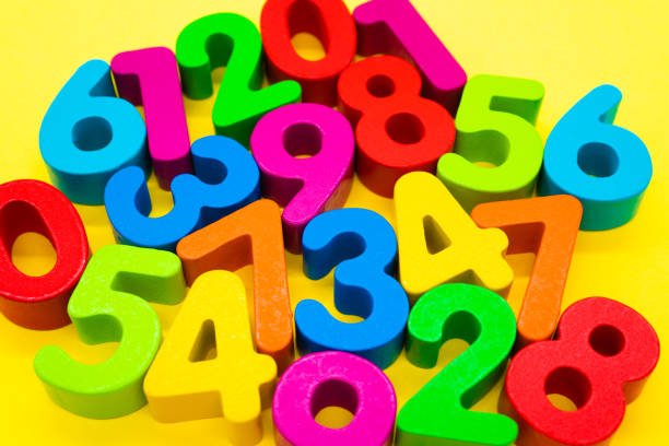 istock Colorful numbers on yellow background 1222172068
