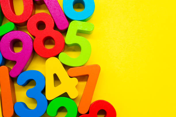 istock Colorful numbers on yellow background 1222172070