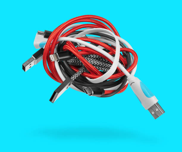 istock Tangled roll of computer wires over blue background 1222172108