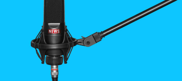 istock Media Journalist Microphone Cut Out on Blue Background 1222172134