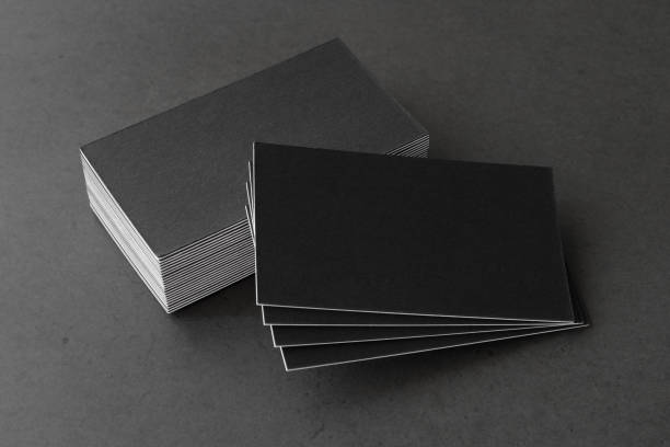 istock Business card on black background. 1222172290