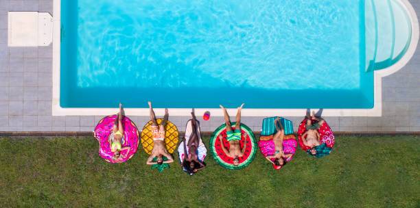 Friends having fun in a swimming pool