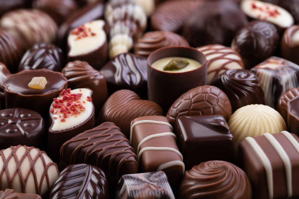 istock chocolate candy with various fillings, sweet food background. 1222179161