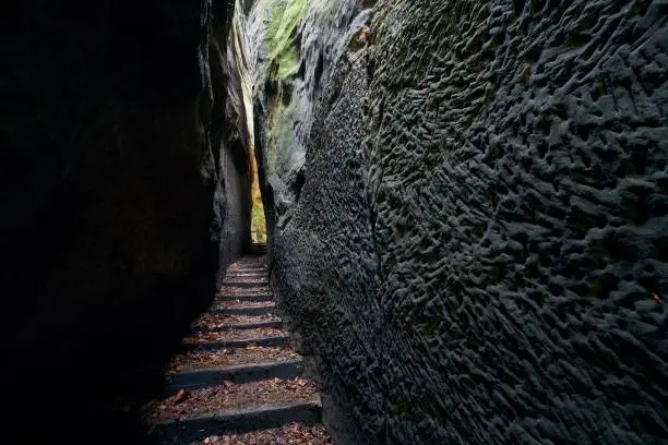 Narrow path in the middle rock formations. Hruba Skala in Bohemian Paradise, Czech Republic