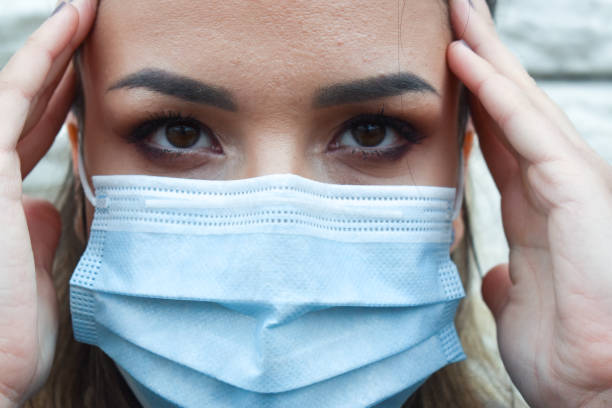 istock Woman outdoors with a face mask 1222183273