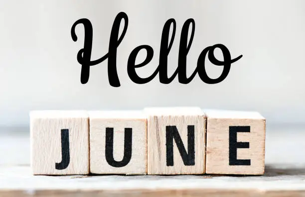 Photo of HELLO JUNE text. Greeting the new month - Concept.