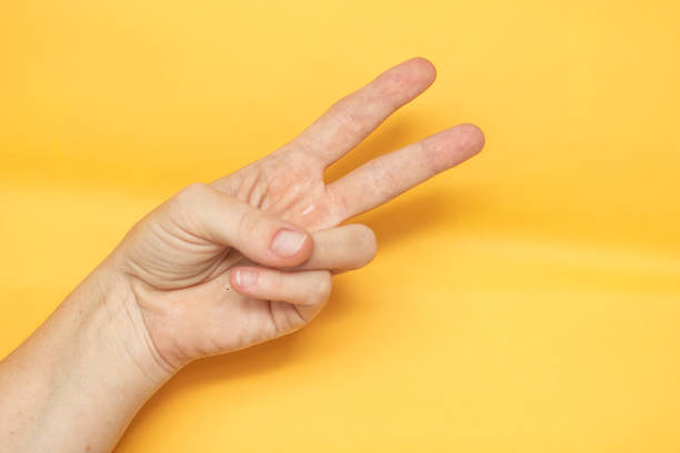 istock HAND SHOWING peace sign 1222186403